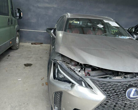 Серый Лексус UX, объемом двигателя 1.99 л и пробегом 99 тыс. км за 18500 $, фото 2 на Automoto.ua