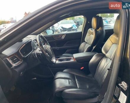 Черный Линкольн Континенталь, объемом двигателя 2.96 л и пробегом 79 тыс. км за 12800 $, фото 12 на Automoto.ua