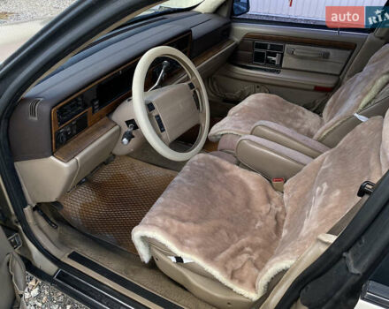 Желтый Линкольн Континенталь, объемом двигателя 3.8 л и пробегом 200 тыс. км за 4500 $, фото 8 на Automoto.ua