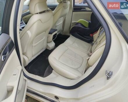 Бежевый Линкольн МКЗ, объемом двигателя 2 л и пробегом 132 тыс. км за 10000 $, фото 3 на Automoto.ua