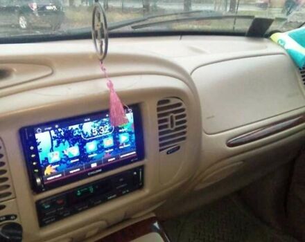 Чорний Лінкольн Navigator, об'ємом двигуна 5.4 л та пробігом 280 тис. км за 6600 $, фото 4 на Automoto.ua