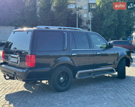 Чорний Лінкольн Navigator, об'ємом двигуна 5.4 л та пробігом 333 тис. км за 9500 $, фото 4 на Automoto.ua