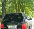 Черный Линкольн Навигатор, объемом двигателя 5.4 л и пробегом 210 тыс. км за 11500 $, фото 1 на Automoto.ua