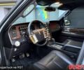 Сірий Лінкольн Navigator, об'ємом двигуна 5.4 л та пробігом 250 тис. км за 18000 $, фото 6 на Automoto.ua