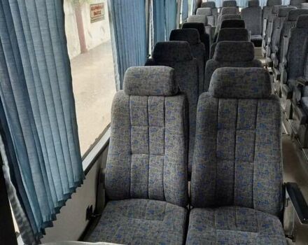 Красный МАН 10.220, объемом двигателя 6.87 л и пробегом 150 тыс. км за 6200 $, фото 8 на Automoto.ua