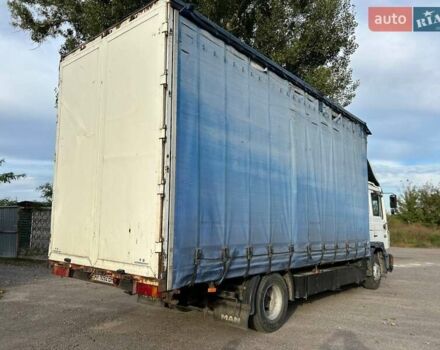 Белый МАН 14.264, объемом двигателя 6.87 л и пробегом 200 тыс. км за 9000 $, фото 1 на Automoto.ua