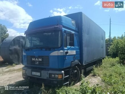 Синий МАН 23.414, объемом двигателя 11.9 л и пробегом 900 тыс. км за 9500 $, фото 1 на Automoto.ua