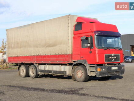 Красный МАН 26.403, объемом двигателя 12 л и пробегом 437 тыс. км за 15500 $, фото 1 на Automoto.ua