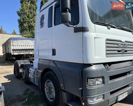 Белый МАН 26.410, объемом двигателя 11.97 л и пробегом 700 тыс. км за 11000 $, фото 4 на Automoto.ua