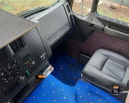 Красный МАН 26.414, объемом двигателя 12 л и пробегом 111 тыс. км за 14700 $, фото 2 на Automoto.ua