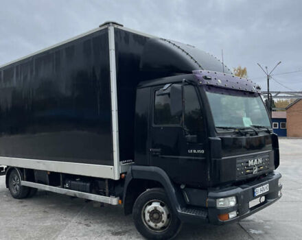Черный МАН 8.150 груз., объемом двигателя 4.6 л и пробегом 700 тыс. км за 11000 $, фото 1 на Automoto.ua