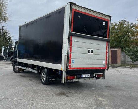 Черный МАН 8.150 груз., объемом двигателя 4.6 л и пробегом 700 тыс. км за 11000 $, фото 3 на Automoto.ua