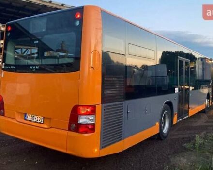 Оранжевый МАН A21, объемом двигателя 12 л и пробегом 700 тыс. км за 15764 $, фото 1 на Automoto.ua