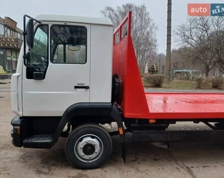 Белый МАН Л 2000, объемом двигателя 4.58 л и пробегом 430 тыс. км за 17000 $, фото 1 на Automoto.ua