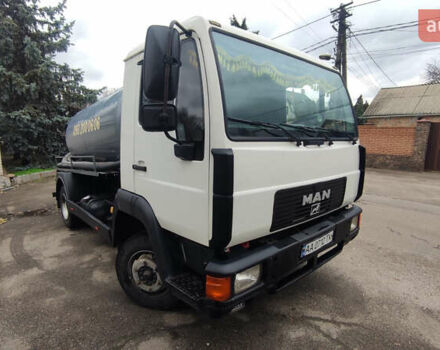 Белый МАН Л 2000, объемом двигателя 4.58 л и пробегом 100 тыс. км за 13500 $, фото 1 на Automoto.ua