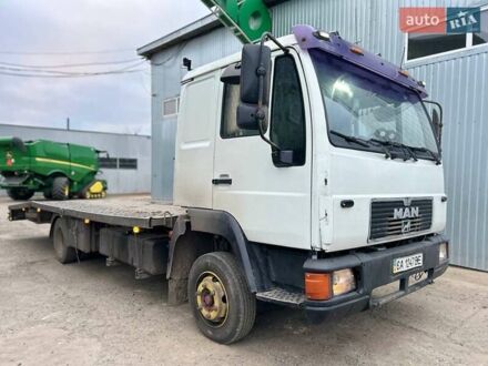 Белый МАН Л 2000, объемом двигателя 4.6 л и пробегом 600 тыс. км за 9900 $, фото 1 на Automoto.ua