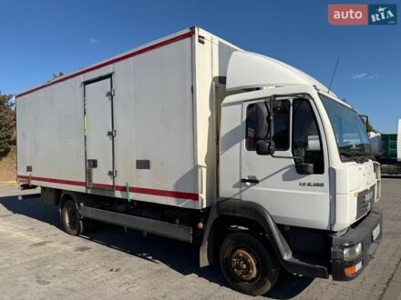 Белый МАН Л 2000, объемом двигателя 4.85 л и пробегом 500 тыс. км за 13000 $, фото 1 на Automoto.ua