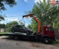 Красный МАН Л 2000, объемом двигателя 5 л и пробегом 338 тыс. км за 35000 $, фото 1 на Automoto.ua