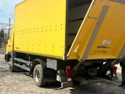 Желтый МАН Л 2000, объемом двигателя 4.58 л и пробегом 600 тыс. км за 12000 $, фото 1 на Automoto.ua