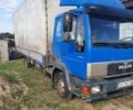 Синий МАН Л 2000, объемом двигателя 6.9 л и пробегом 650 тыс. км за 8000 $, фото 1 на Automoto.ua
