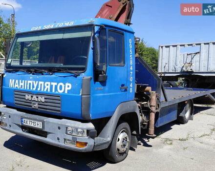 Синій МАН L 2000, об'ємом двигуна 4.59 л та пробігом 30 тис. км за 20943 $, фото 1 на Automoto.ua