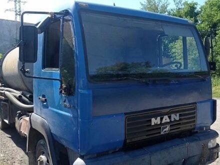 Синий МАН Л 2000, объемом двигателя 4.58 л и пробегом 300 тыс. км за 12000 $, фото 1 на Automoto.ua