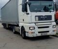 Белый МАН ТГА, объемом двигателя 10.52 л и пробегом 395 тыс. км за 16000 $, фото 1 на Automoto.ua