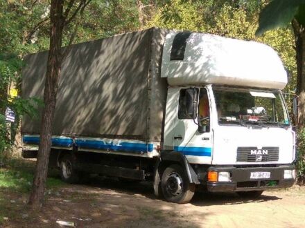 Белый МАН ТГА, объемом двигателя 4.6 л и пробегом 850 тыс. км за 9800 $, фото 1 на Automoto.ua