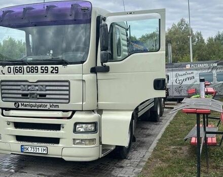 Белый МАН ТГА, объемом двигателя 11.95 л и пробегом 400 тыс. км за 37000 $, фото 1 на Automoto.ua