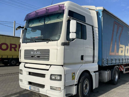Белый МАН ТГА, объемом двигателя 10.52 л и пробегом 608 тыс. км за 10500 $, фото 1 на Automoto.ua