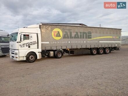 Белый МАН ТГА, объемом двигателя 10.5 л и пробегом 378 тыс. км за 11900 $, фото 1 на Automoto.ua