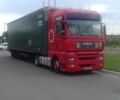 Красный МАН ТГА, объемом двигателя 10.5 л и пробегом 300 тыс. км за 15000 $, фото 1 на Automoto.ua