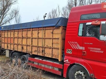 МАН ТГА 2005 в Днепре (Днепропетровске) на Automoto.ua Красный МАН ТГА, объемом двигателя 12.82 л и пробегом 301 тыс. км за 12000 $, фото 1 на Automoto.ua