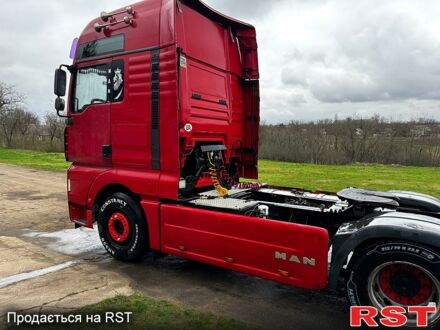 Красный МАН ТГА, объемом двигателя 10.5 л и пробегом 470 тыс. км за 15500 $, фото 1 на Automoto.ua