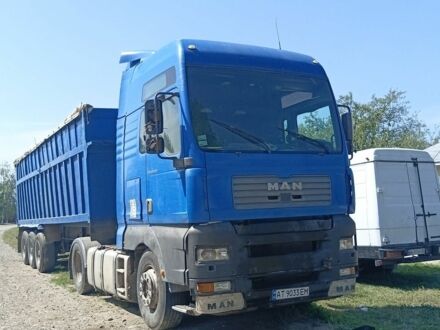 Синий МАН ТГА, объемом двигателя 11.97 л и пробегом 100 тыс. км за 8200 $, фото 1 на Automoto.ua