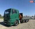 Зеленый МАН ТГА, объемом двигателя 12.8 л и пробегом 910 тыс. км за 29800 $, фото 1 на Automoto.ua