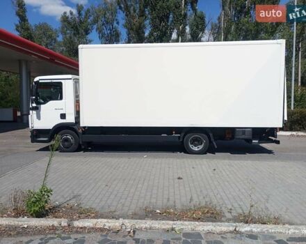 Белый МАН ТГЛ, объемом двигателя 4.58 л и пробегом 620 тыс. км за 22000 $, фото 2 на Automoto.ua