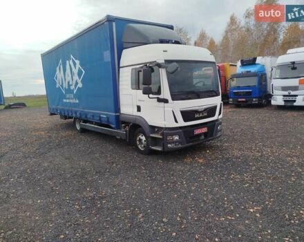 Белый МАН ТГЛ, объемом двигателя 4.6 л и пробегом 740 тыс. км за 30000 $, фото 2 на Automoto.ua