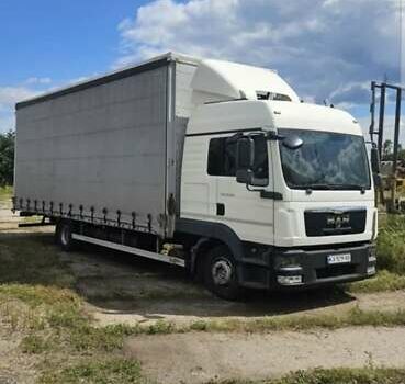 Белый МАН ТГЛ, объемом двигателя 4.58 л и пробегом 980 тыс. км за 26000 $, фото 1 на Automoto.ua