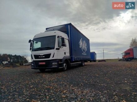 Белый МАН ТГЛ, объемом двигателя 4.6 л и пробегом 740 тыс. км за 30000 $, фото 1 на Automoto.ua