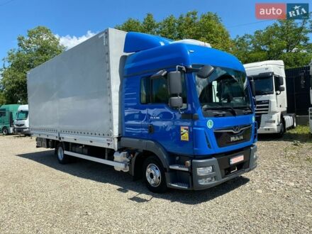 Белый МАН ТГЛ, объемом двигателя 4.6 л и пробегом 430 тыс. км за 34300 $, фото 1 на Automoto.ua