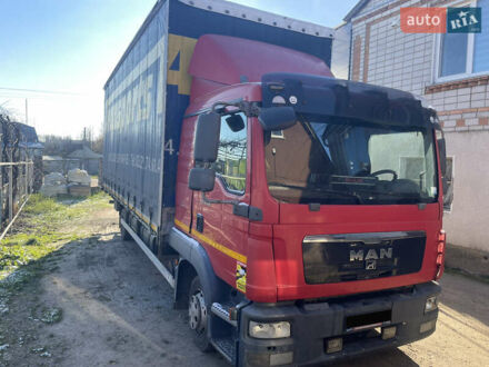 Красный МАН ТГЛ, объемом двигателя 4.58 л и пробегом 700 тыс. км за 23500 $, фото 1 на Automoto.ua