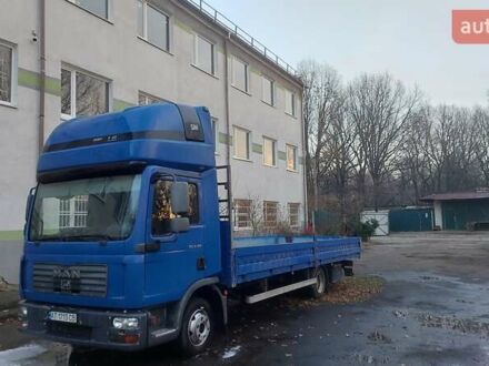 Синий МАН ТГЛ, объемом двигателя 4.6 л и пробегом 784 тыс. км за 13700 $, фото 1 на Automoto.ua