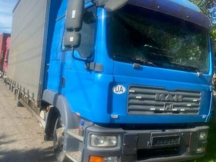 Синий МАН ТГЛ, объемом двигателя 6.9 л и пробегом 800 тыс. км за 17000 $, фото 1 на Automoto.ua