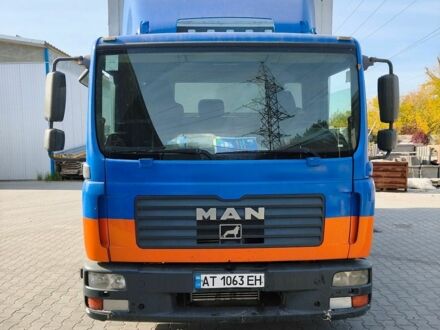 Синий МАН ТГЛ, объемом двигателя 4.58 л и пробегом 770 тыс. км за 12500 $, фото 1 на Automoto.ua