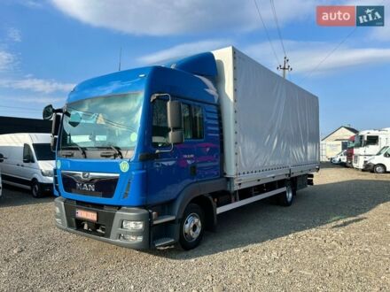 Синий МАН ТГЛ, объемом двигателя 4.6 л и пробегом 430 тыс. км за 34650 $, фото 1 на Automoto.ua