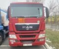 Красный МАН ТГС, объемом двигателя 10.52 л и пробегом 480 тыс. км за 33000 $, фото 1 на Automoto.ua