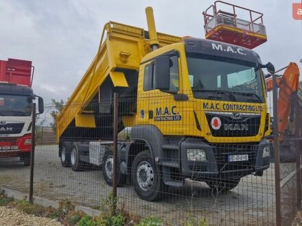 Желтый МАН ТГС, объемом двигателя 12.4 л и пробегом 435 тыс. км за 86500 $, фото 1 на Automoto.ua