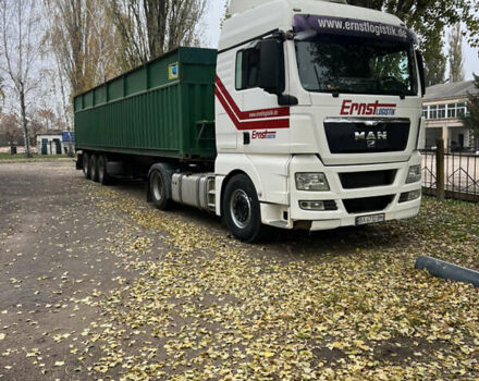 Красный МАН ТГКС, объемом двигателя 10.5 л и пробегом 890 тыс. км за 28000 $, фото 1 на Automoto.ua