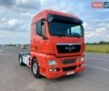 Красный МАН ТГКС, объемом двигателя 10.5 л и пробегом 924 тыс. км за 14600 $, фото 1 на Automoto.ua